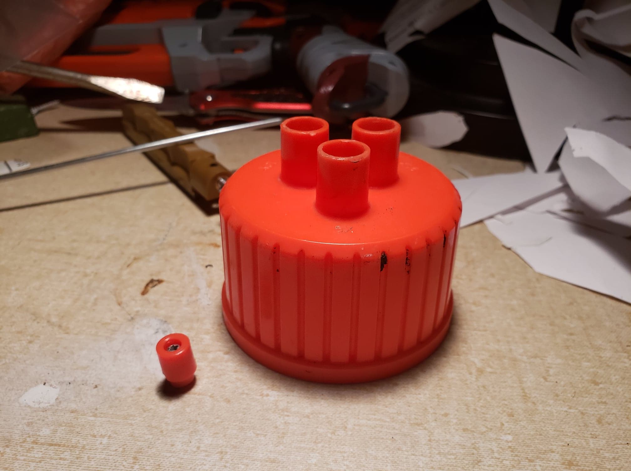 &quot;Apologies for the clutter, its my sharpening area/nerf gun storage place.  Here is the nozzles and the part that busted.&quot;